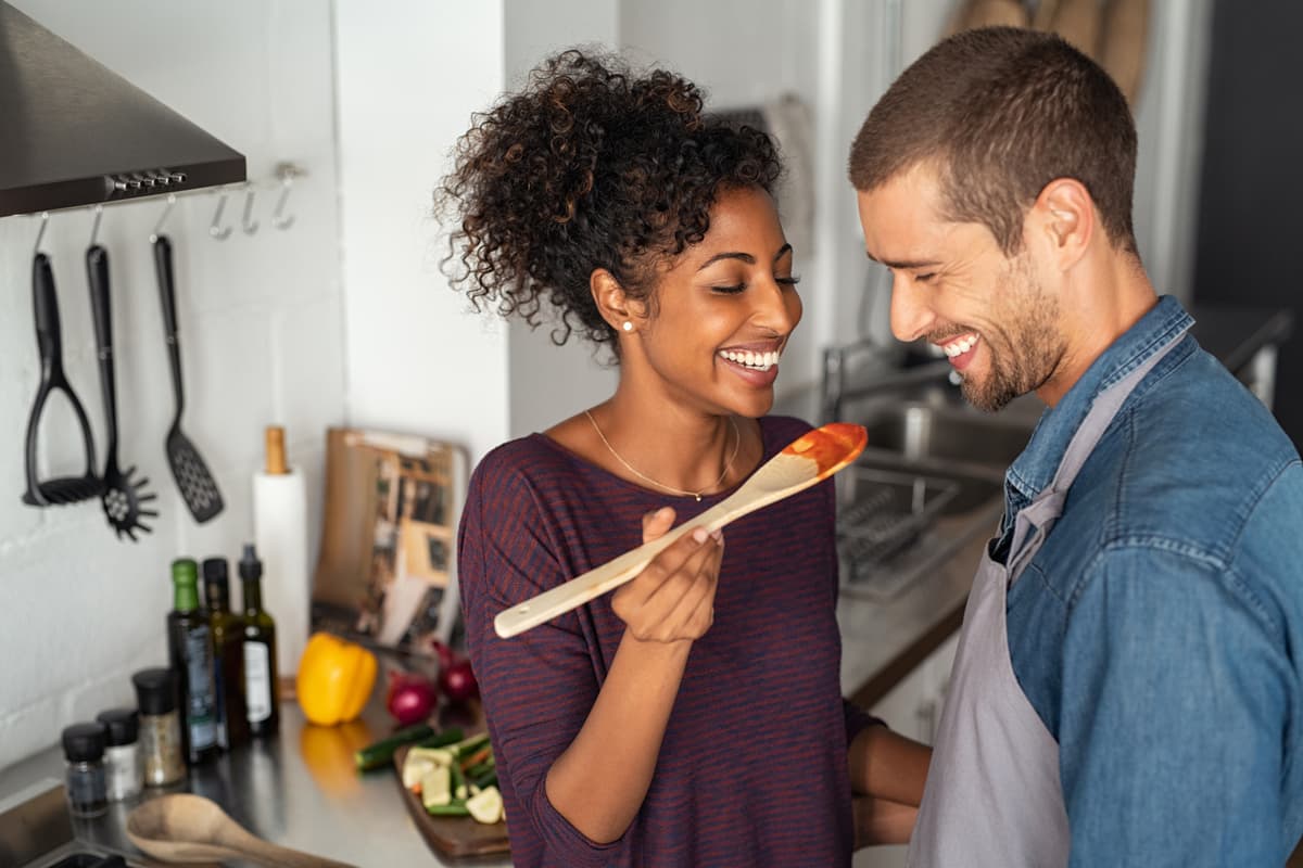 Happy couple in kitchen